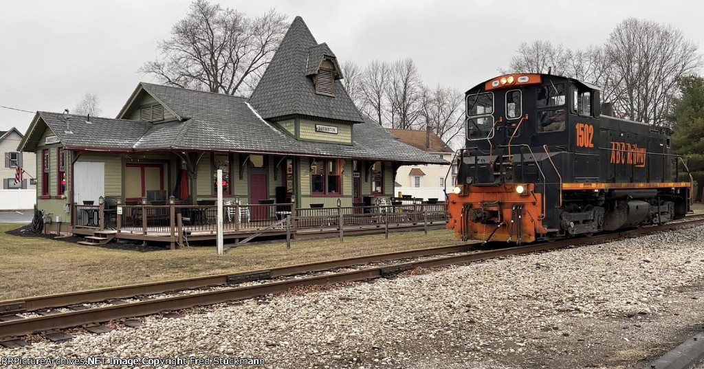 AB 1502 passes the 1890 depot, now housing the Anna Bean Coffee Co.